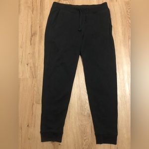 Medium sized black sweatpants